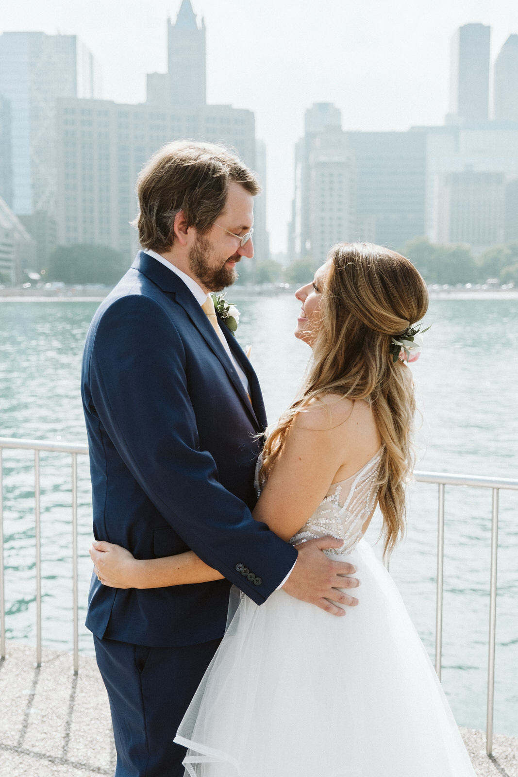 Small Wedding Venues in Chicago photo featuring a couple standing looking at one another. Photo by Michael & Kristin wedding photography and videography.