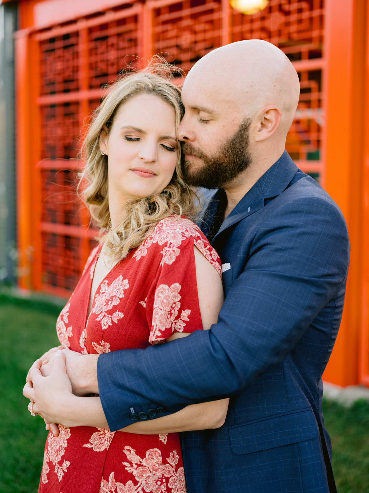 ping tom memorial park engagement photos in front of orange structure